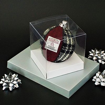 red and black harris tweed christmas bauble from roses workshop presented in a clear gift box