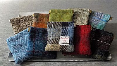 a selection of harris tweed flextop mens purses handmade by roses workshop